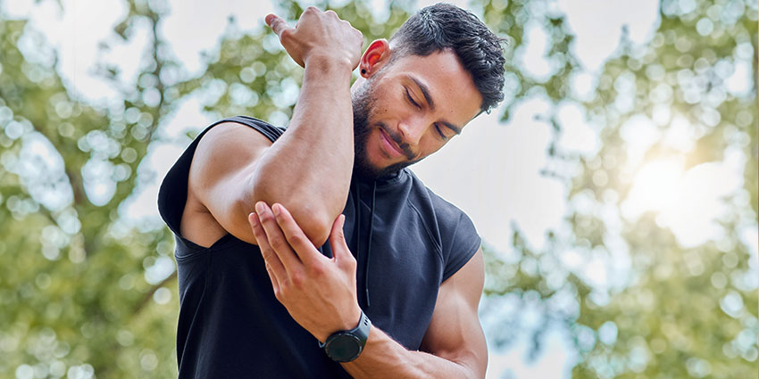 patient needing elbow pain chiropractor in the Financial District, Downtown San Francisco